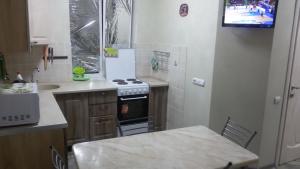 A cozinha ou kitchenette de Guesthouse Tomskaya