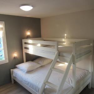 Poschodová posteľ alebo postele v izbe v ubytovaní Résidence les Grimaudières