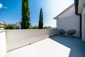 Balkón nebo terasa v ubytování Mari House
