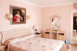 Posteľ alebo postele v izbe v ubytovaní Hotel Paraíso Del Mar