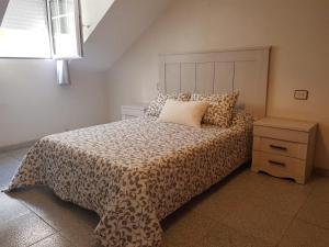 Posteľ alebo postele v izbe v ubytovaní Apartamento Telefónica Trece