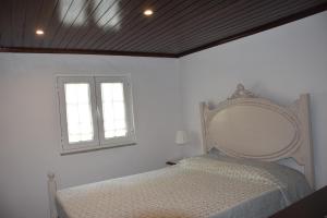 Postel nebo postele na pokoji v ubytování Casa das Castanheiras