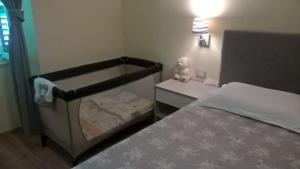Postel nebo postele na pokoji v ubytování Casa Veneziana