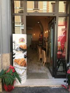 ห้องอาหารหรือที่รับประทานอาหารของ Vanella Rome Domus