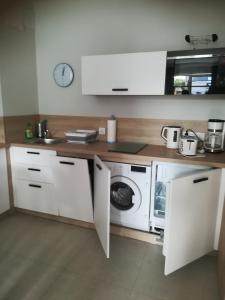 Kuchnia lub aneks kuchenny w obiekcie Bel Mare Patio B217