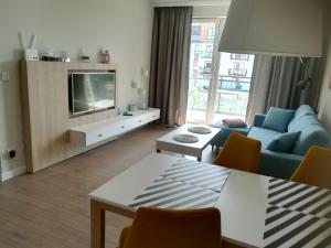 Telewizja i/lub zestaw kina domowego w obiekcie Bel Mare Patio B217