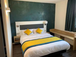 Postel nebo postele na pokoji v ubytování ATOLON PARK HOTEL