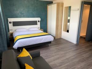 Postel nebo postele na pokoji v ubytování ATOLON PARK HOTEL