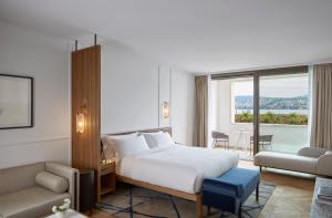 Alex Lake Zürich客房内的一张或多张床位