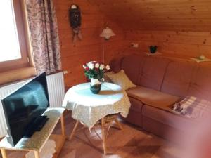 Ein Sitzbereich in der Unterkunft Ferienwohnung Carina und Herbert Erlsbacher