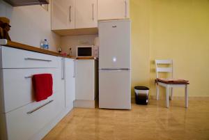 Kuchyň nebo kuchyňský kout v ubytování 48 Love Beach - AC/WIFI