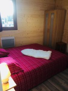 Cama ou camas em um quarto em Le sirac