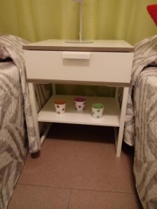 Łóżko lub łóżka w pokoju w obiekcie APARTAMENTO BEDIESTA