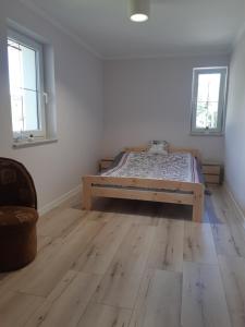 Кровать или кровати в номере Beskid - Świątkowa
