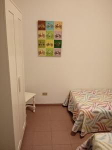 Łóżko lub łóżka w pokoju w obiekcie APARTAMENTO BEDIESTA