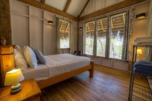 מיטה או מיטות בחדר ב-Eco Venao Lodge, Playa Venao