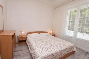 Posteľ alebo postele v izbe v ubytovaní Apartments Brico