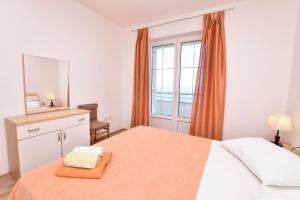 Posteľ alebo postele v izbe v ubytovaní Apartments Brico
