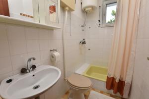Kúpeľňa v ubytovaní Apartments Brico