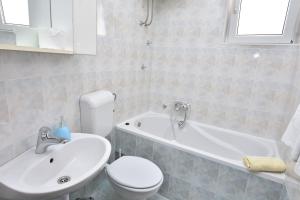 Kúpeľňa v ubytovaní Apartments Brico
