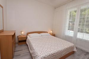 Posteľ alebo postele v izbe v ubytovaní Apartments Brico