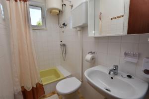 Kúpeľňa v ubytovaní Apartments Brico