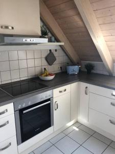 Kuchyň nebo kuchyňský kout v ubytování Ferienwohnung Ankerplatz Bodensee