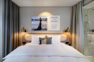 Ein Bett oder Betten in einem Zimmer der Unterkunft Hotel Felix
