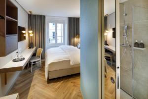 Ein Bett oder Betten in einem Zimmer der Unterkunft Hotel Felix