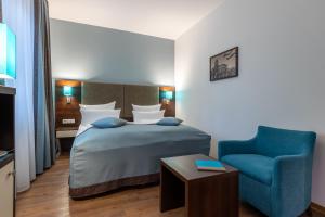 Cama ou camas em um quarto em Trip Inn Hotel Messe Westend