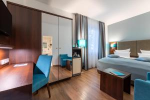 Cama ou camas em um quarto em Trip Inn Hotel Messe Westend