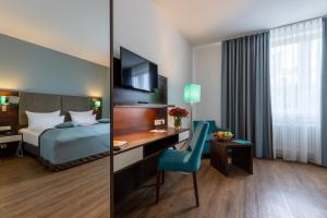 Cama ou camas em um quarto em Trip Inn Hotel Messe Westend