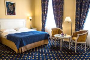 Ein Bett oder Betten in einem Zimmer der Unterkunft Hotel Volgograd