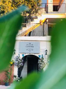 a building with a sign that reads amarantinho at Capiedra Hotel in Uçhisar
