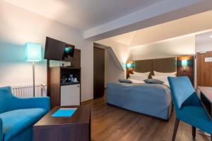 Cama ou camas em um quarto em Trip Inn Hotel Messe Westend