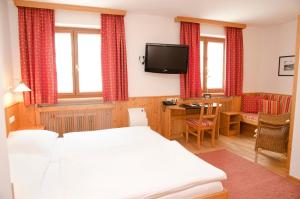 Voodi või voodid majutusasutuse Hotel Gasthof König toas