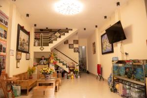 a lobby of a building with a snowflake on the ceiling at Minh Tam Guesthouse in Hue