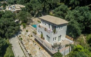an aerial view of a house with a pool at Villa Douros in Parga