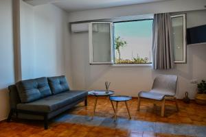 Posezení v ubytování Pharos Apartments