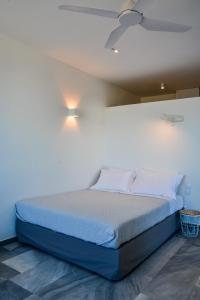Postel nebo postele na pokoji v ubytování Pharos Apartments