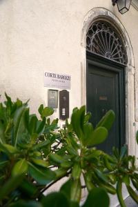 a parking meter in front of a door at Corte Barozzi Venice Suites in Venice