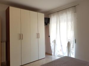 TV a/nebo společenská místnost v ubytování Appartamento 10 minuti dal mare