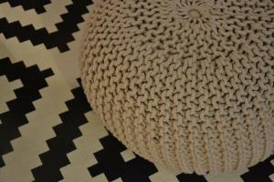 a crocheted vase sitting on top of a table at Burdigala Homes - Appart de Lalande in Bordeaux