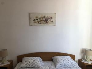 Postel nebo postele na pokoji v ubytování Guesthouse Tariba