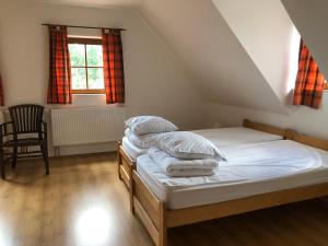 Postel nebo postele na pokoji v ubytování CHALUPA Honzík - VILLA Vrchlabí