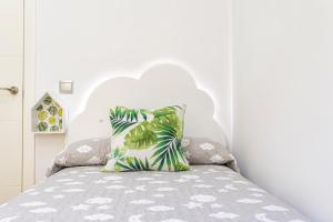 Posteľ alebo postele v izbe v ubytovaní Apartamentos Momas La Casa De Mamá