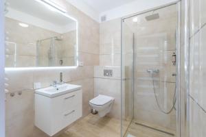 Kúpeľňa v ubytovaní Apartment Flamingo 27 by Noclegi Renters