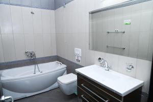 Koupelna v ubytování Hotel Emi