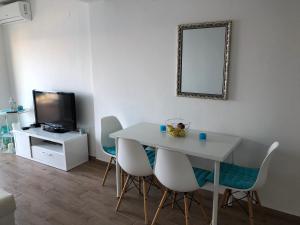 Televízia a/alebo spoločenská miestnosť v ubytovaní Sunset-Oase 4