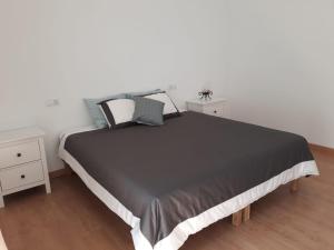 Postel nebo postele na pokoji v ubytování Vivienda Casa Mary